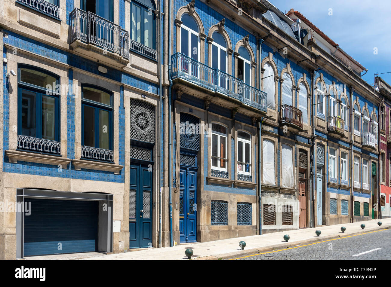 street of traditional tiled merchants houses in Porto, Portugal. Stock Photo