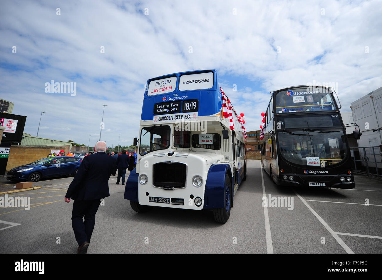 Buses are seen before the victory parade through Lincoln City centre. Stock Photo