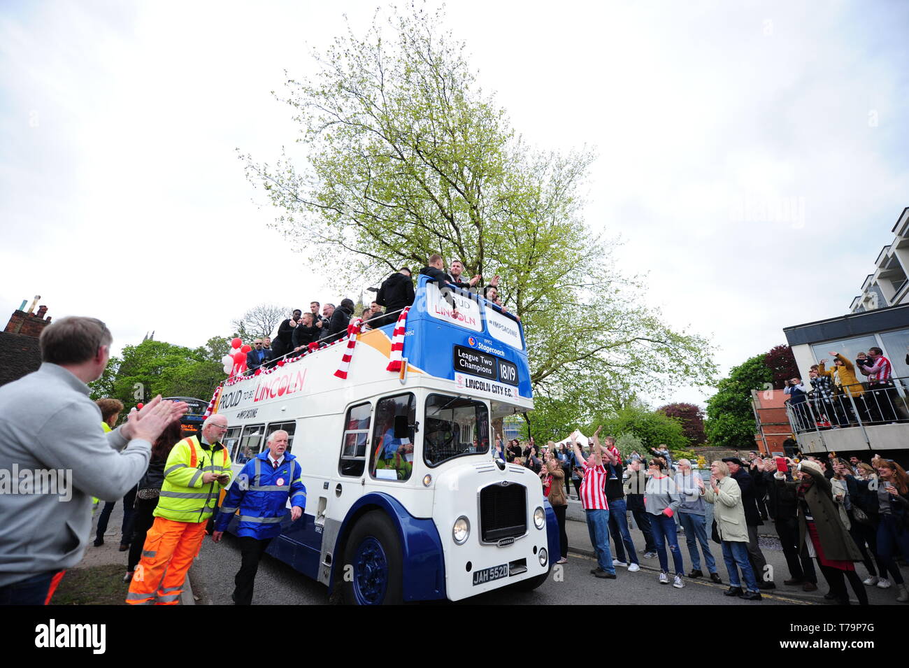 The player's bus during the victory parade through Lincoln City centre. Stock Photo