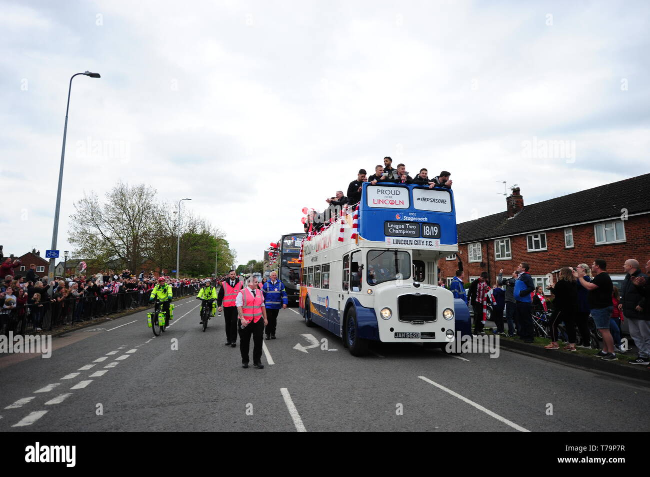 The player's bus during the victory parade through Lincoln City centre. Stock Photo