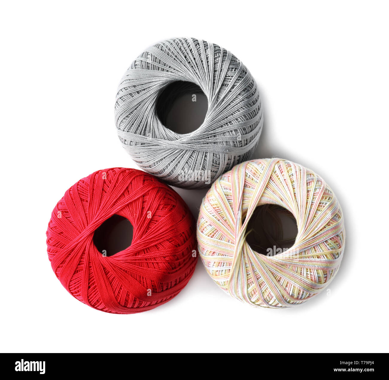 Knitting threads on white background Stock Photo - Alamy