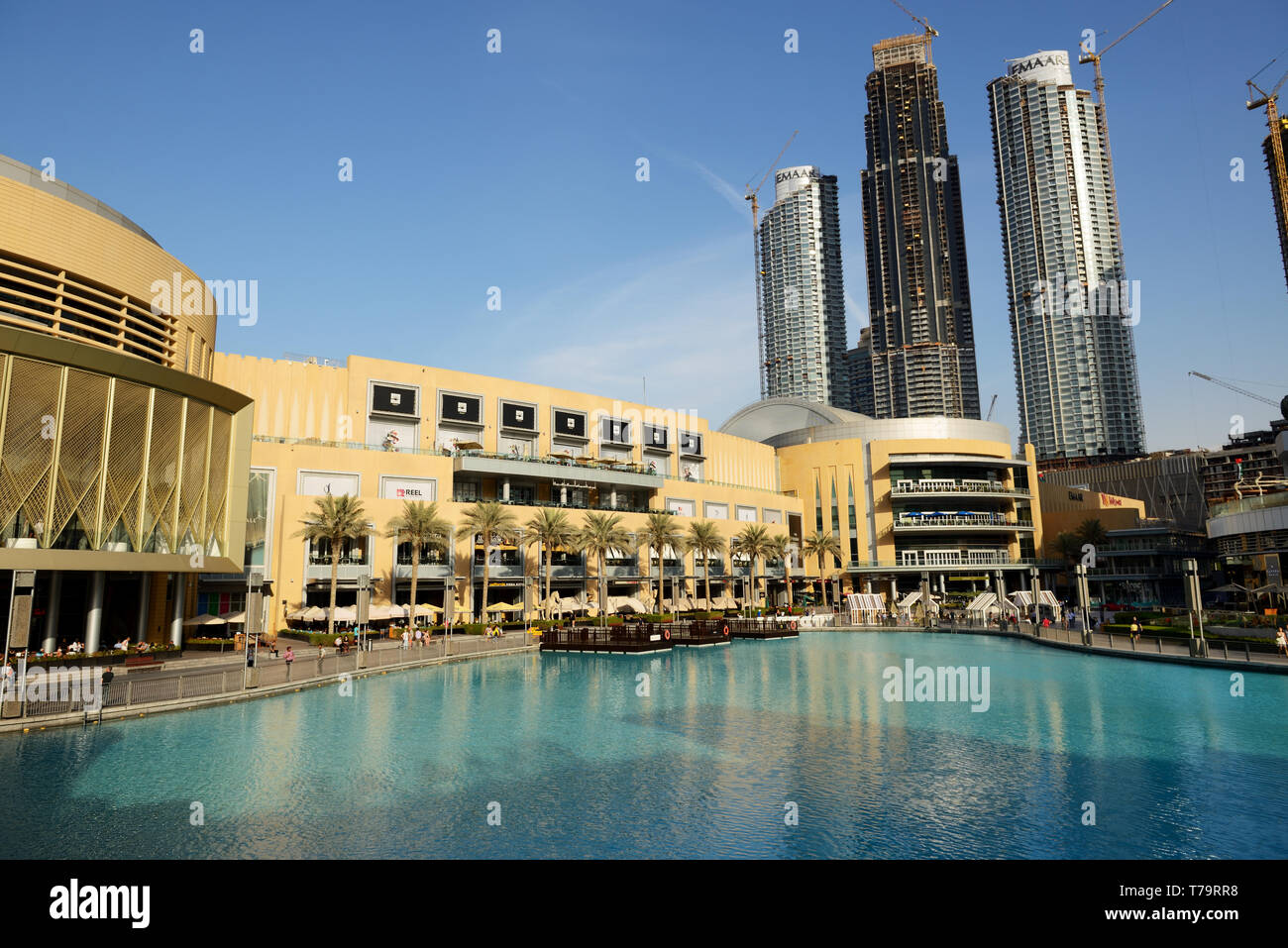 DUBAI, UAE - NOVEMBER 19: The Dubai Mall is the worlds largest shopping mall and construction of new skyscrapers.  It is located in Burj Khalifa compl Stock Photo