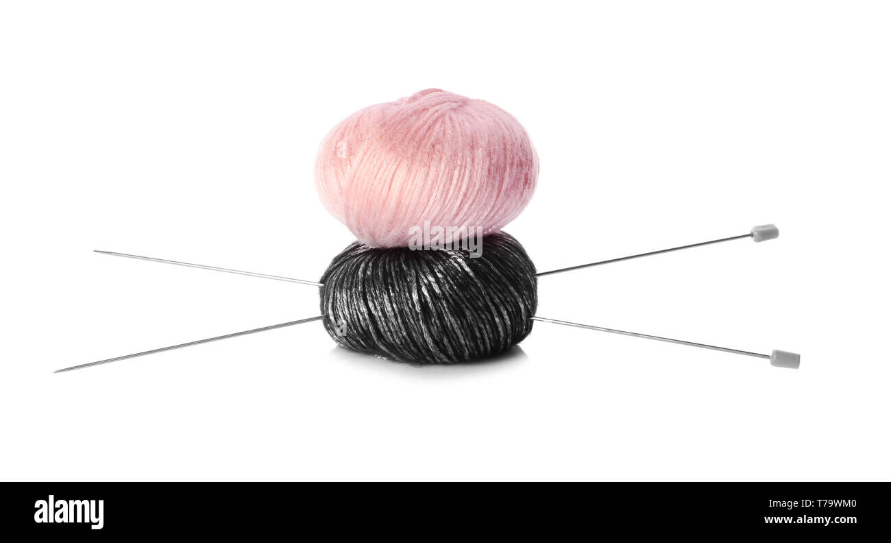 Color knitting yarn with needles on white background Stock Photo - Alamy