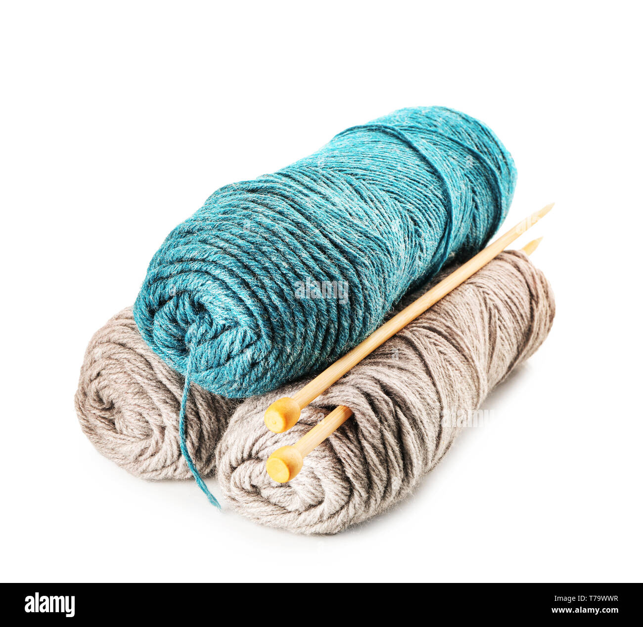 Color knitting yarn with needles on white background Stock Photo - Alamy