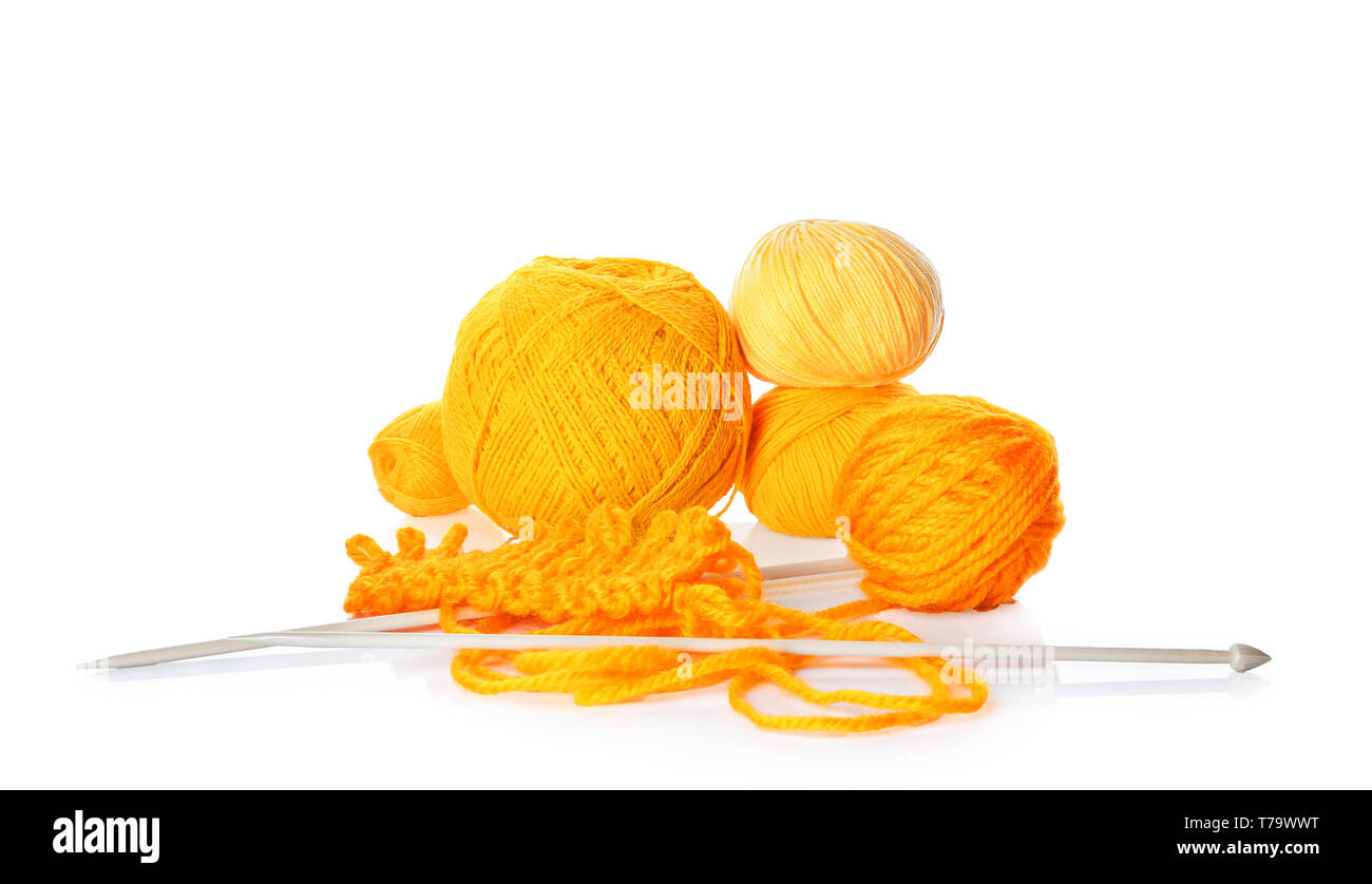 Color knitting yarn with needles on white background Stock Photo - Alamy