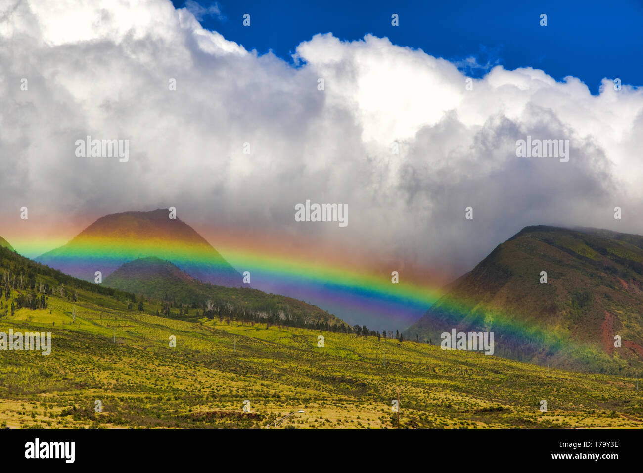 Rainbow across West Maui Mountains Stock Photo