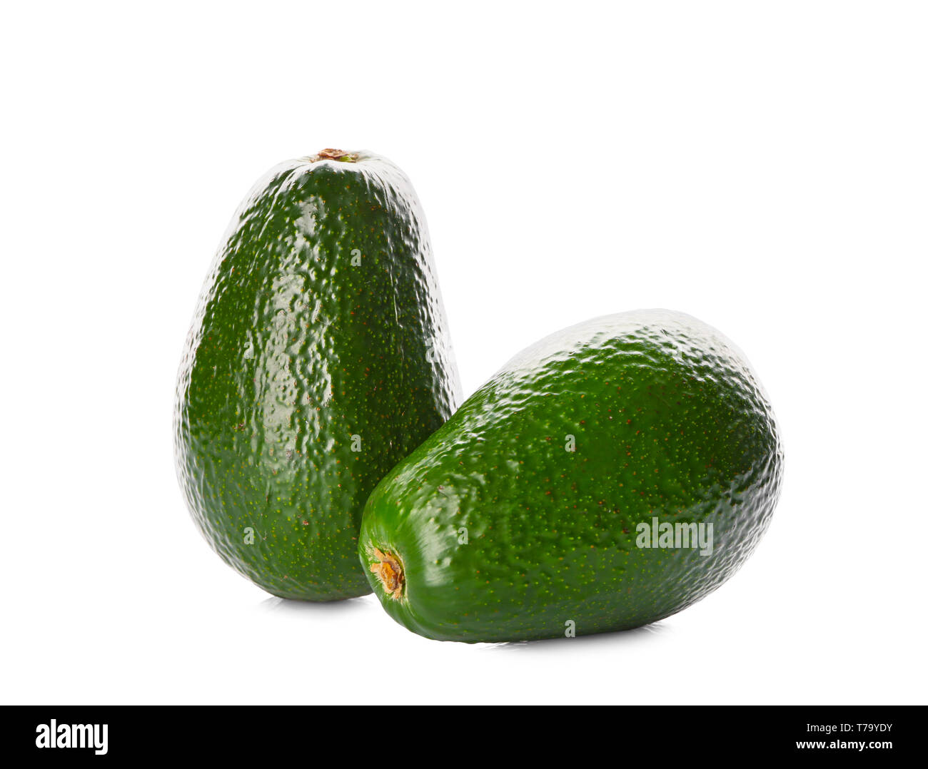 Fresh avocados on white background Stock Photo - Alamy