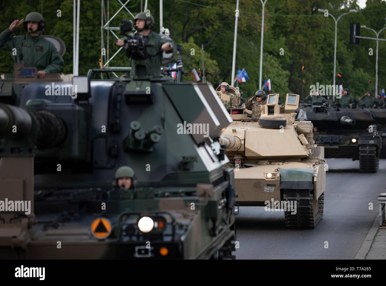 An M1A2 Abrams Tank and crew (middle) from 2nd Battalion, 34th Armored Regiment, 1st Infantry Division from Fort Riley, Kansas, participate in the Poland Constitution Day Parade in Warsaw, Poland, May 3, 2019. Approximately 30 Soldiers from 2nd Bn, 34th Armored Regt., 1st ABCT, 1st ID and four Soldiers from 5th Battalion, 7th Air Defense Artillery out of Baumholder, Germany, took part in Poland’s Constitution Day Parade. (U.S. Army photo by Sgt. Thomas Mort) Stock Photo