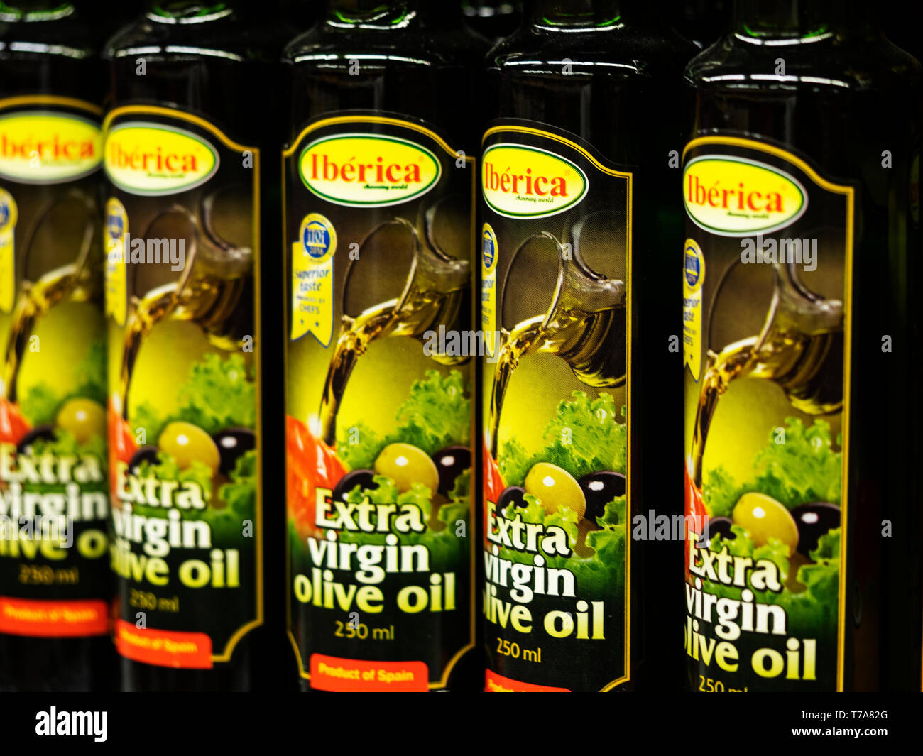 Iberica extra virgin olive oil on the shelf in the store Stock Photo ...