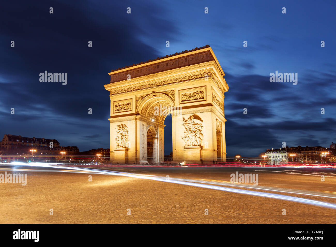 Arc De Triomphe and light trails, Paris Stock Photo