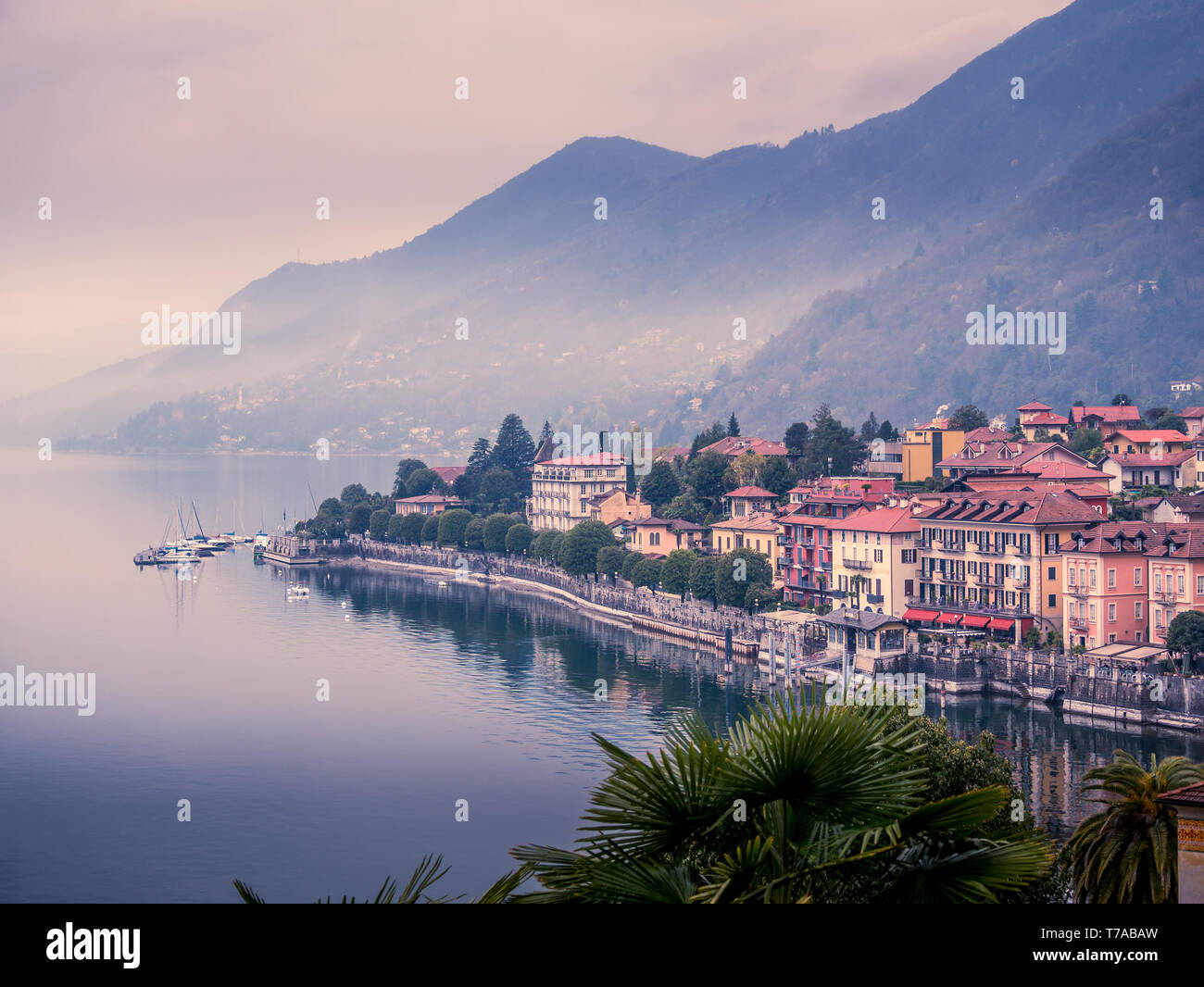 Image of a panorama view of cannero riviera at lake maggiore in italy on a foggy cloudy day Stock Photo