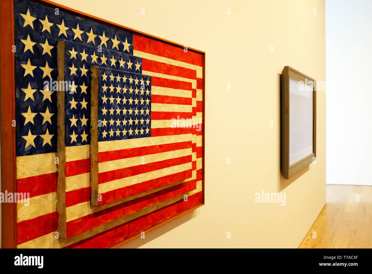 Three Flags (1958) by American artist Jasper Johns display in Whitney Museum of American Art. New York City.USA Stock Photo