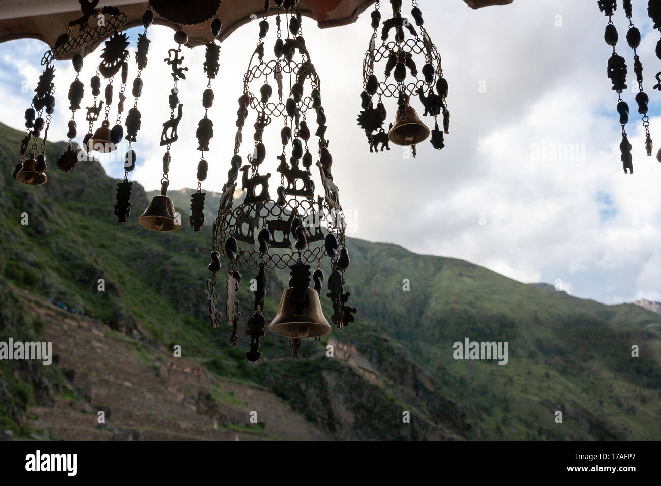 Wind chimes hanging in a shop in the Andes. Ollantaytambo, Peru Stock Photo