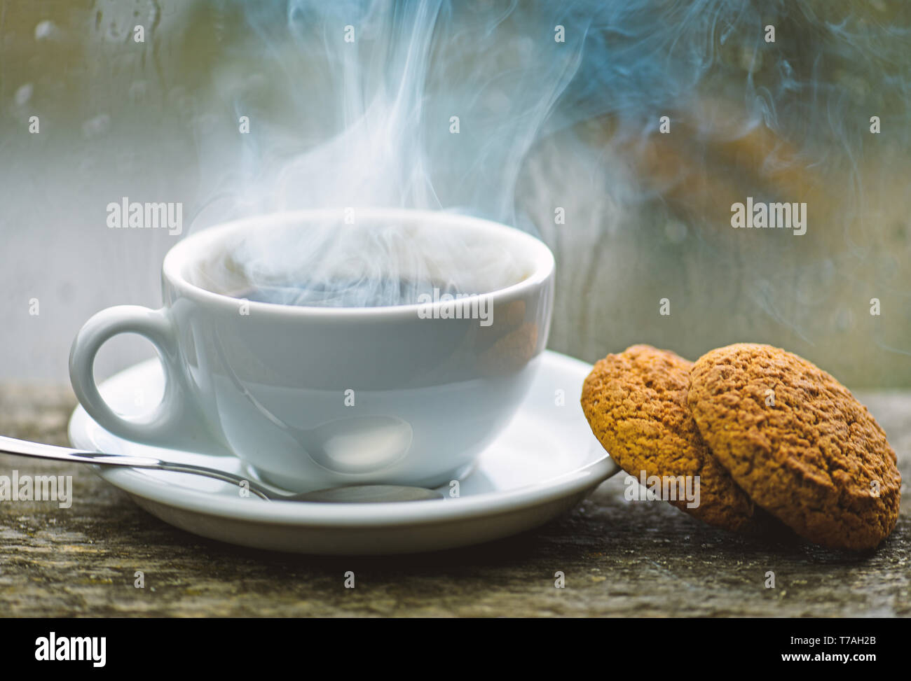 Coffee Time On Rainy Day Fresh Brewed Coffee In White Cup Or Mug On Windowsill Wet Glass Window And Cup Of Hot Caffeine Beverage Coffee Drink With Oat Cookies Dessert Enjoying Coffee