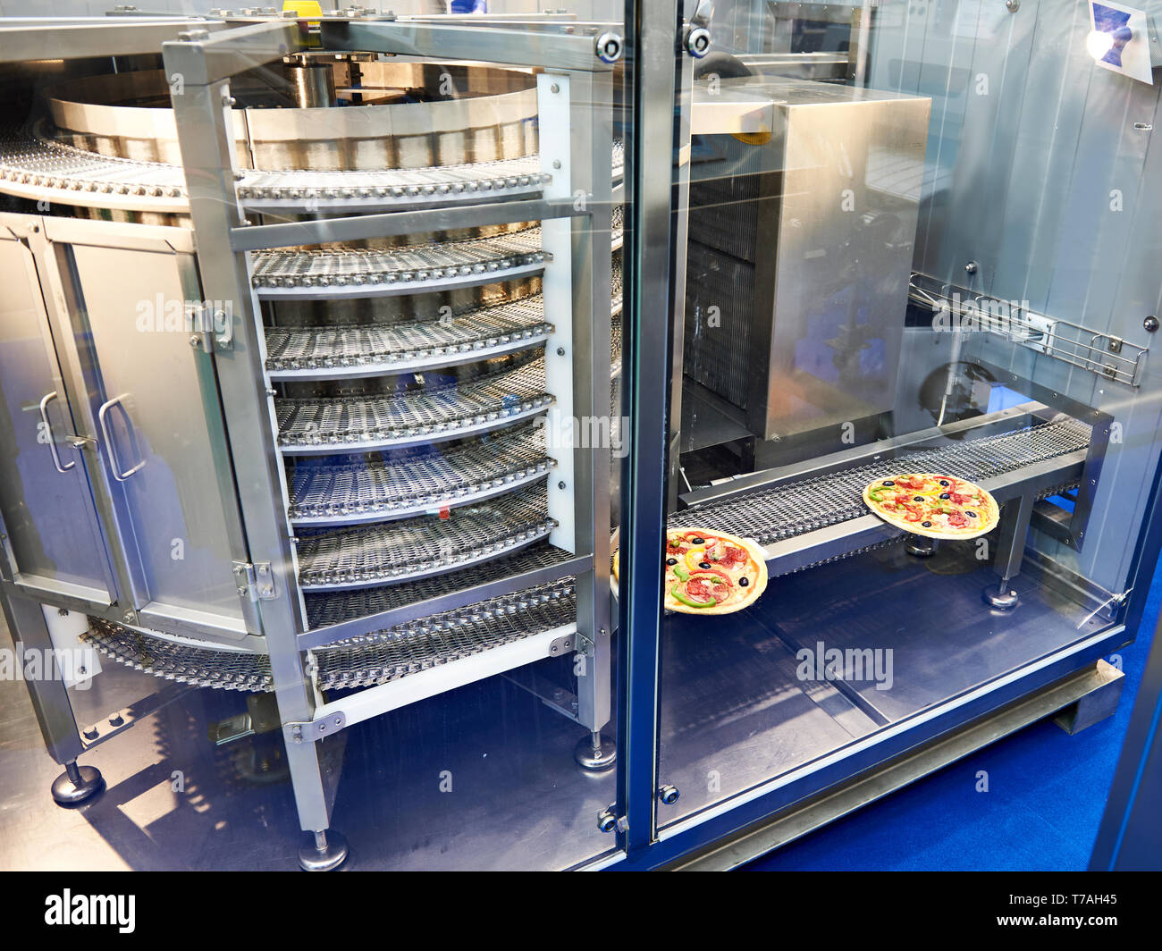 Spiral freezer for food products on exhibition Stock Photo
