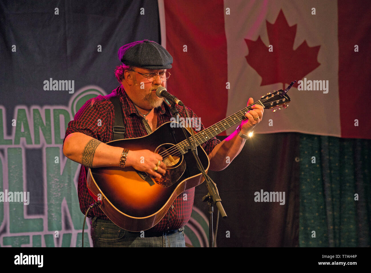 J.P. Cormier playing at the Shetland Folk Festival 2019. He is a Canadian bluegrass folk Celtic singer-songwriter and multi-instrumentalist. Stock Photo