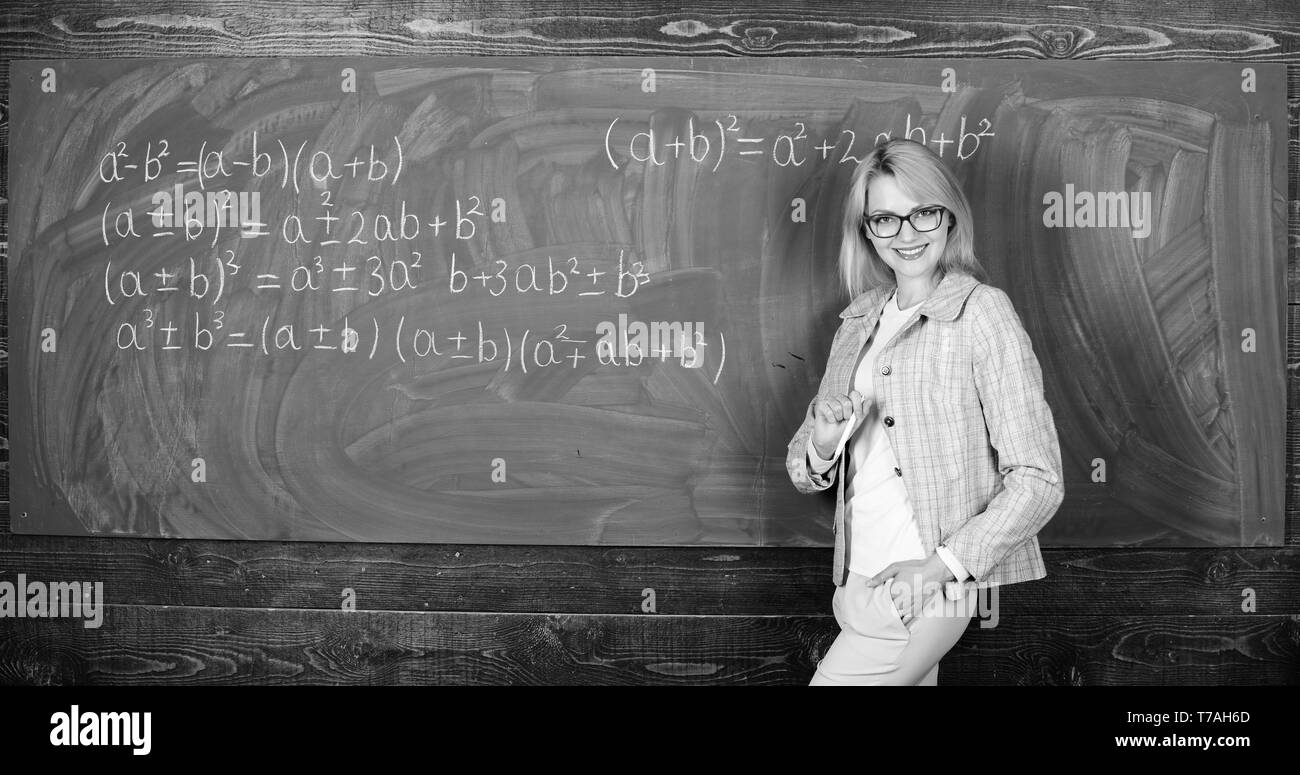teacher on school lesson at blackboard. woman in classroom. Home