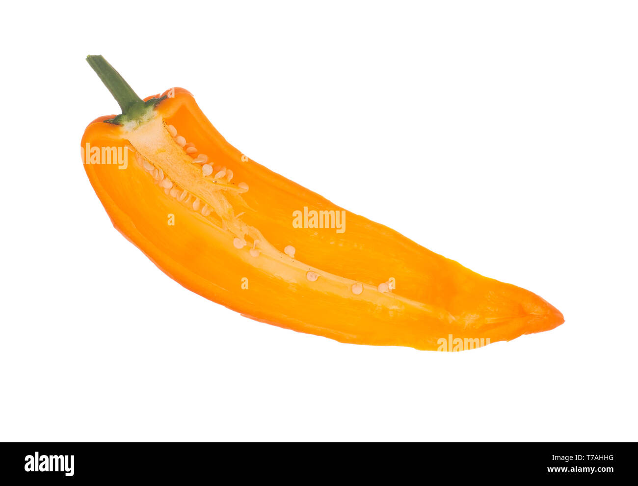 Yellow colour Cubanelle sweet pepper cut open to reveal seeds inside isolated on white background. Capsicum annuum. Aka Italian frying pepper. Stock Photo