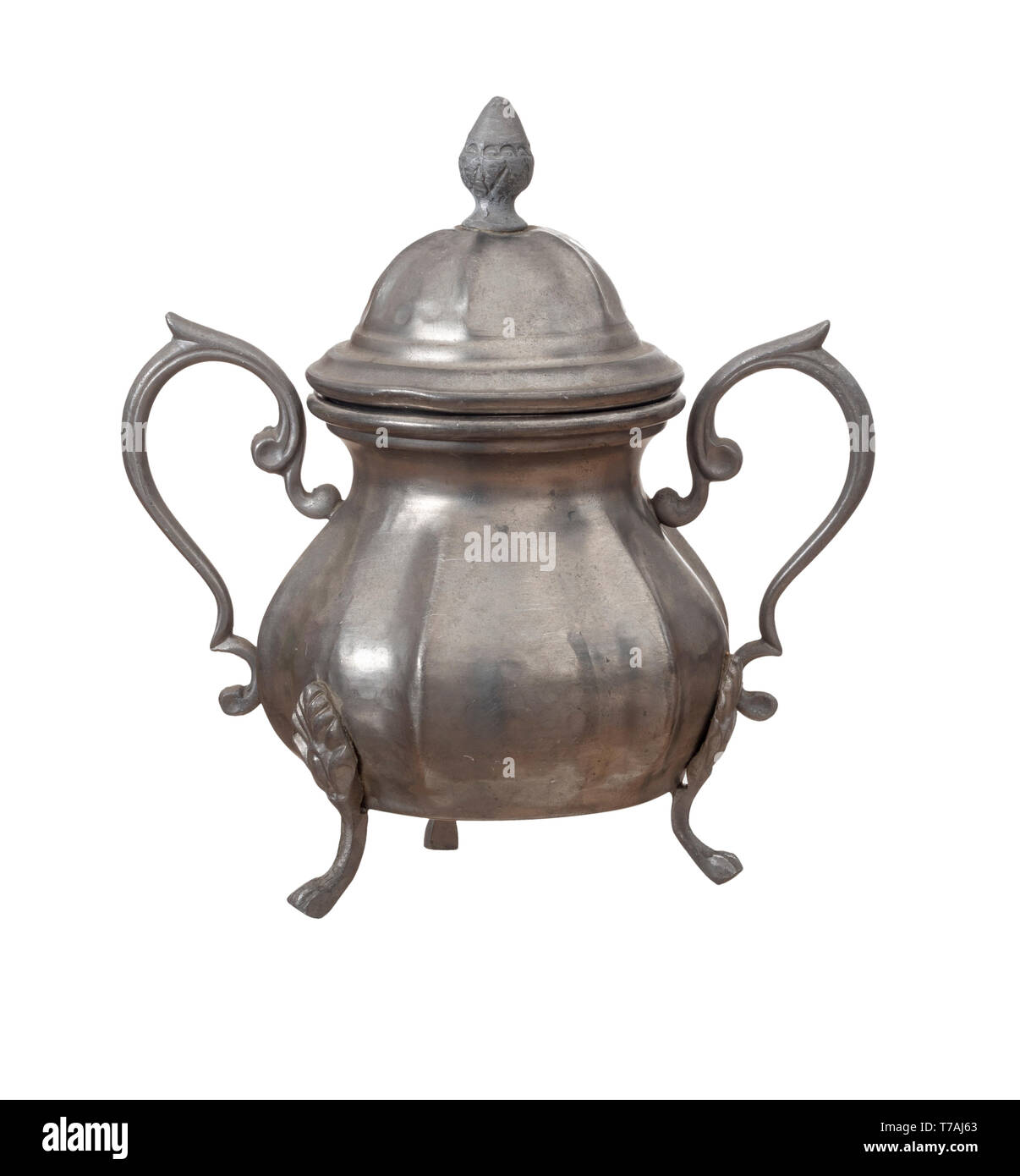 Vintage pewter sugar bowl with lid isolated on white background. Highly
