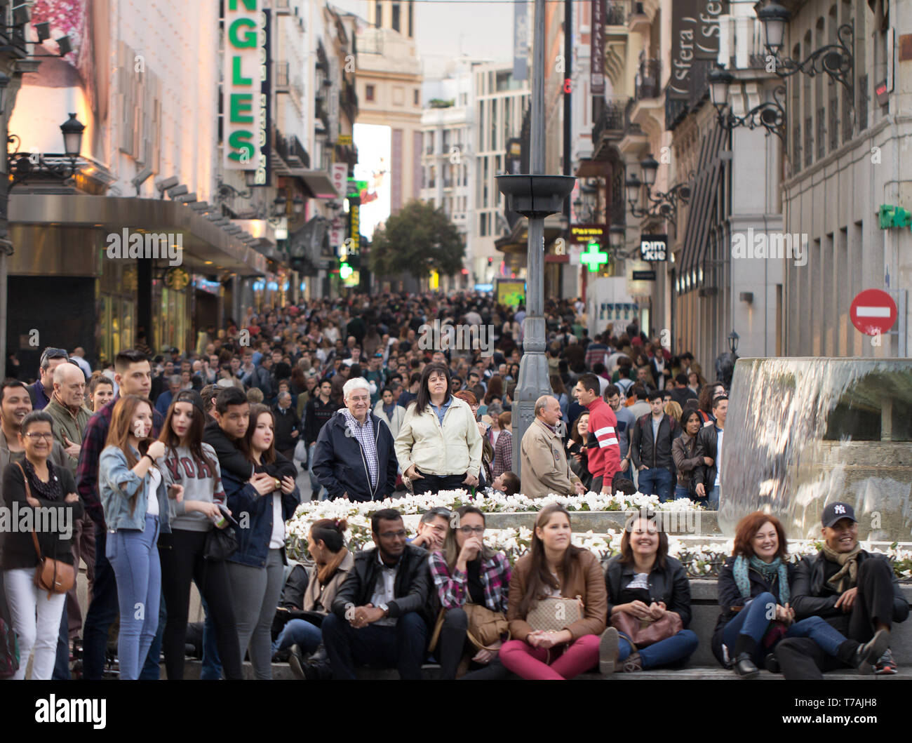 MADRID, SPAIN - APRIL 2015: crowd of people on street in Madrid on April 2015. Stock Photo