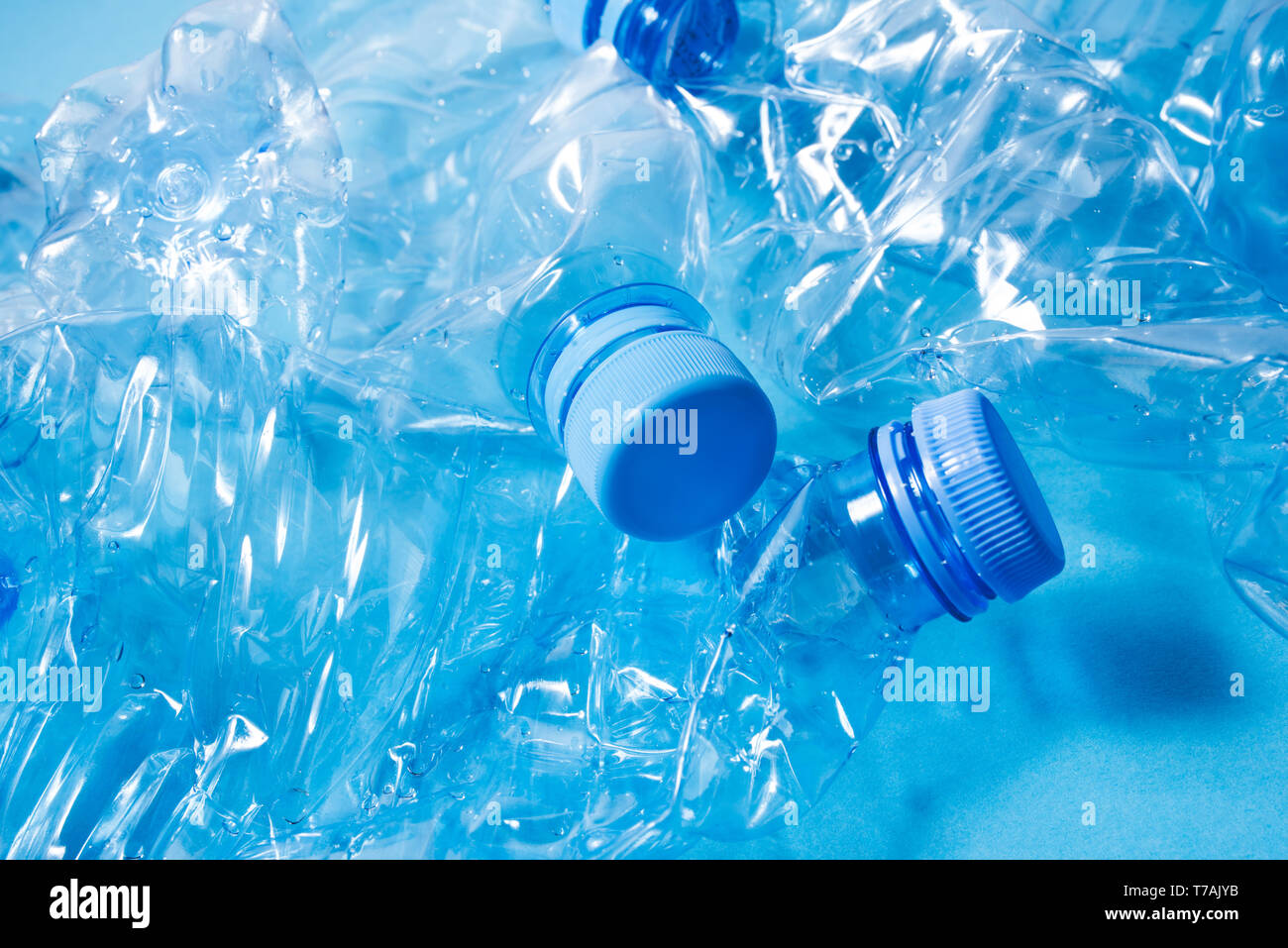 Crumpled plastic bottles of mineral water. Plastic waste Stock Photo
