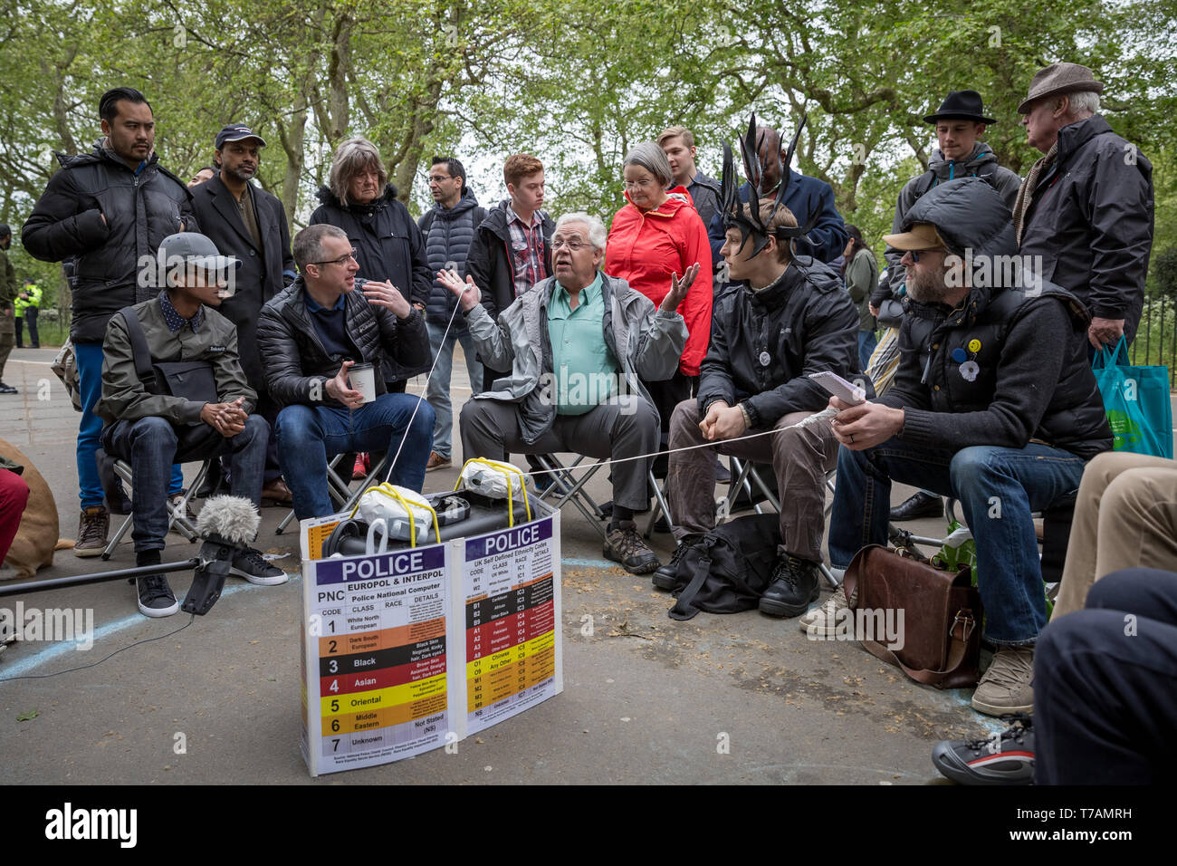Religious, political preaching and debates continue at Speakers' Corner, the public speaking area of Hyde Park in London, UK. Stock Photo