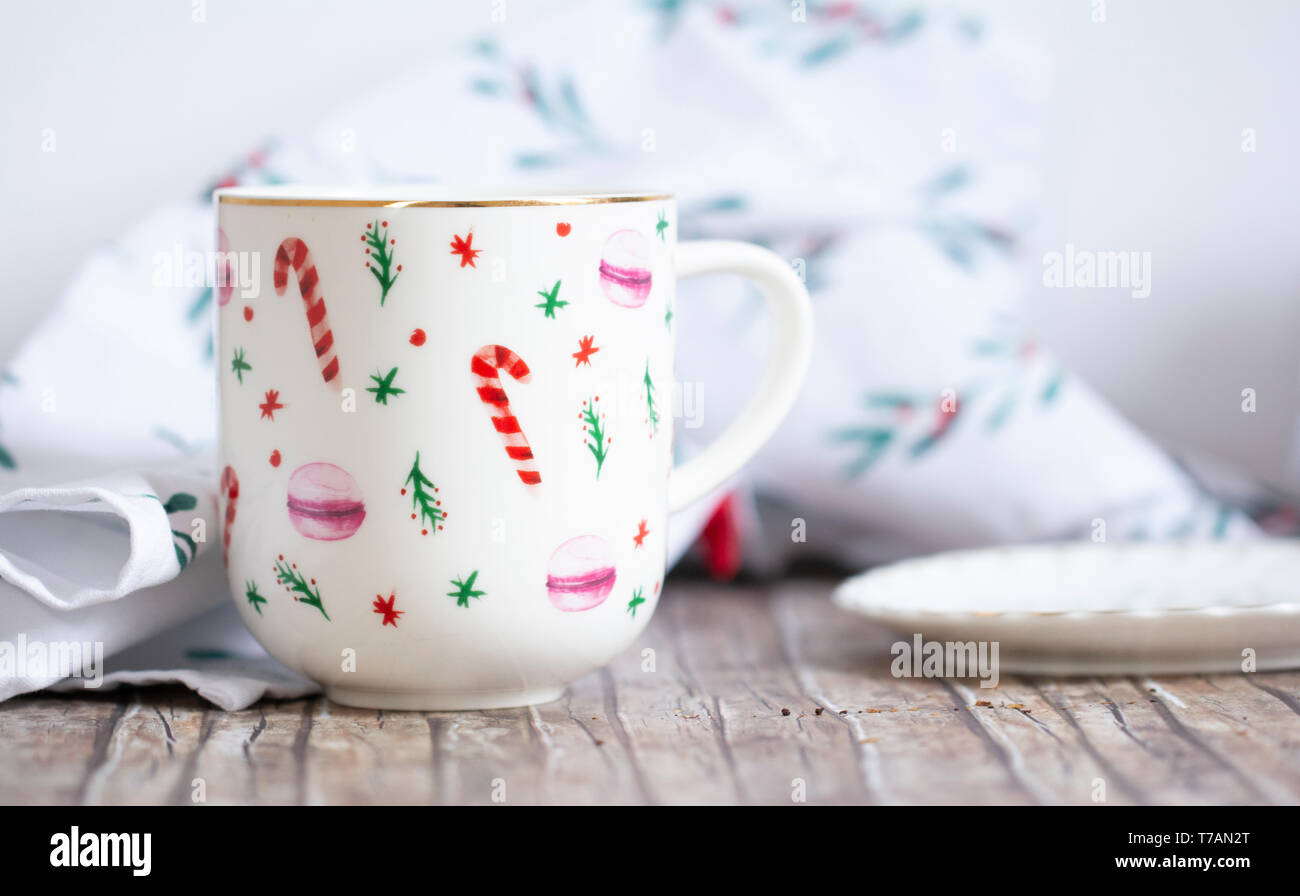 closeup of ceramic cup on wood table Stock Photo