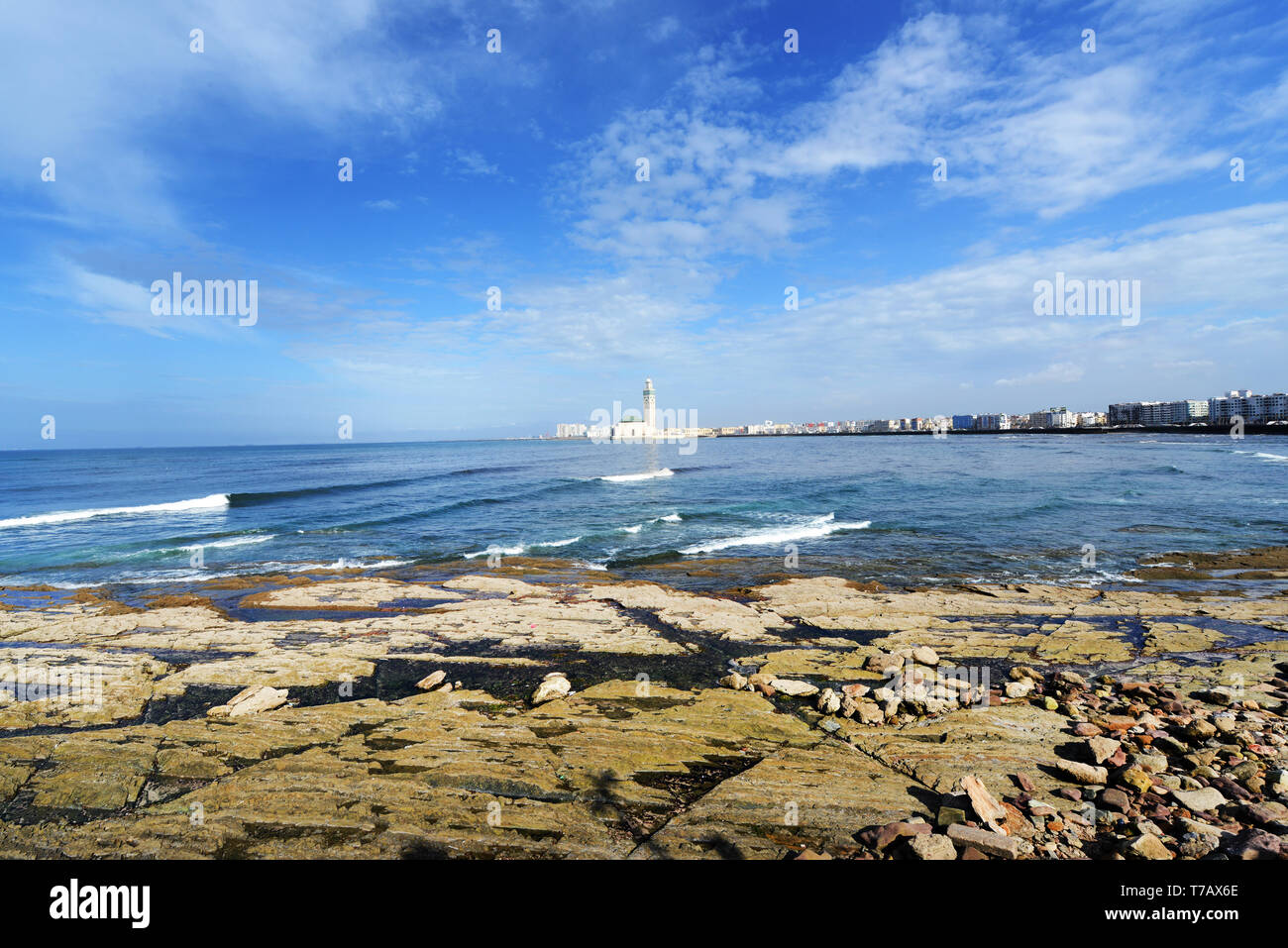 The Atlantic ocean coast with the Hassan II mosque in the background. Stock Photo