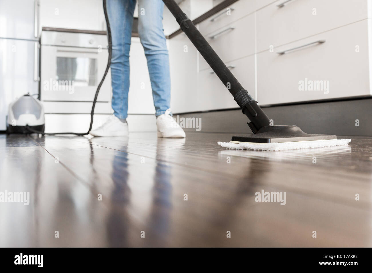 Professional Home Cleaning Service Woman Washes The Floor With A