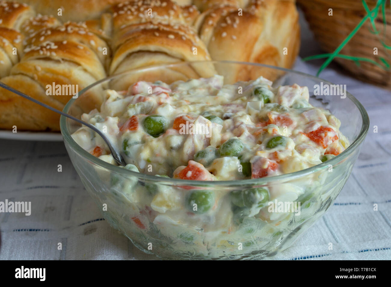 Table ful of food on easter holyday. Colored eggs and bread Stock Photo