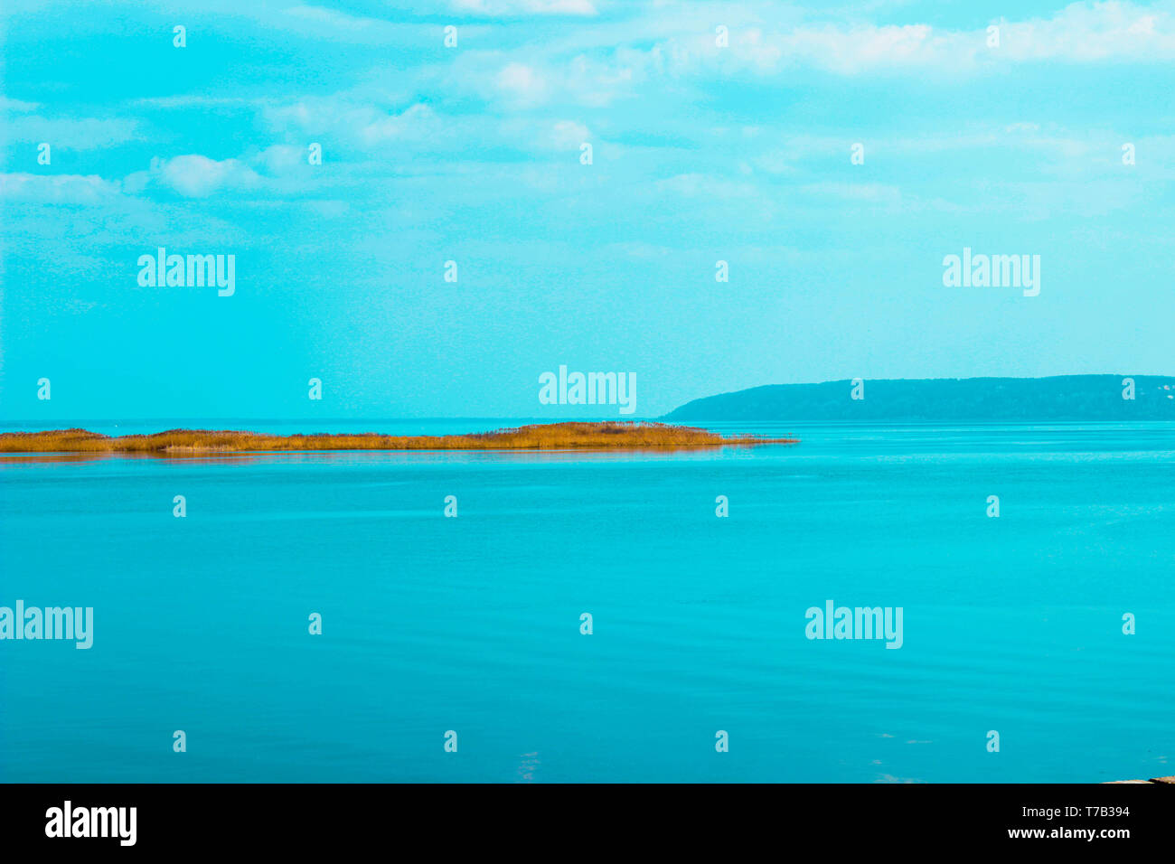 The photo of blue water island view Stock Photo - Alamy