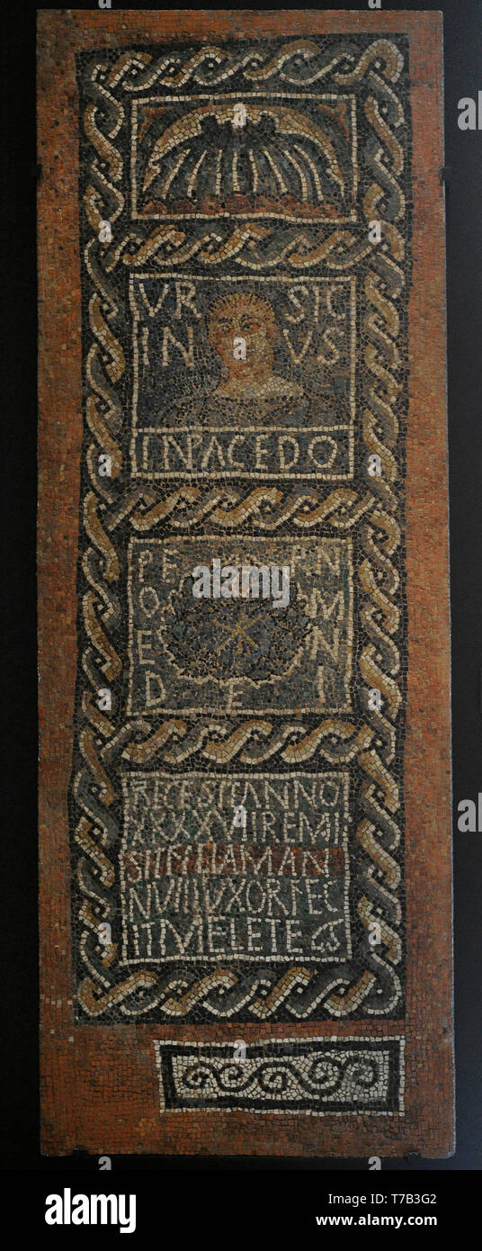 Memorial plaque of Ursicinus. From top to bottom, a scallop, a portrait of the deceased with a dalmatic, a Chi Rho surrounded by a laurel wreath and an inscription. Mid-4th century AD (326-361). Mosaic. From Alfaro (La Rioja, Spain). National Archaeological Museum. Madrid. Spain. Stock Photo