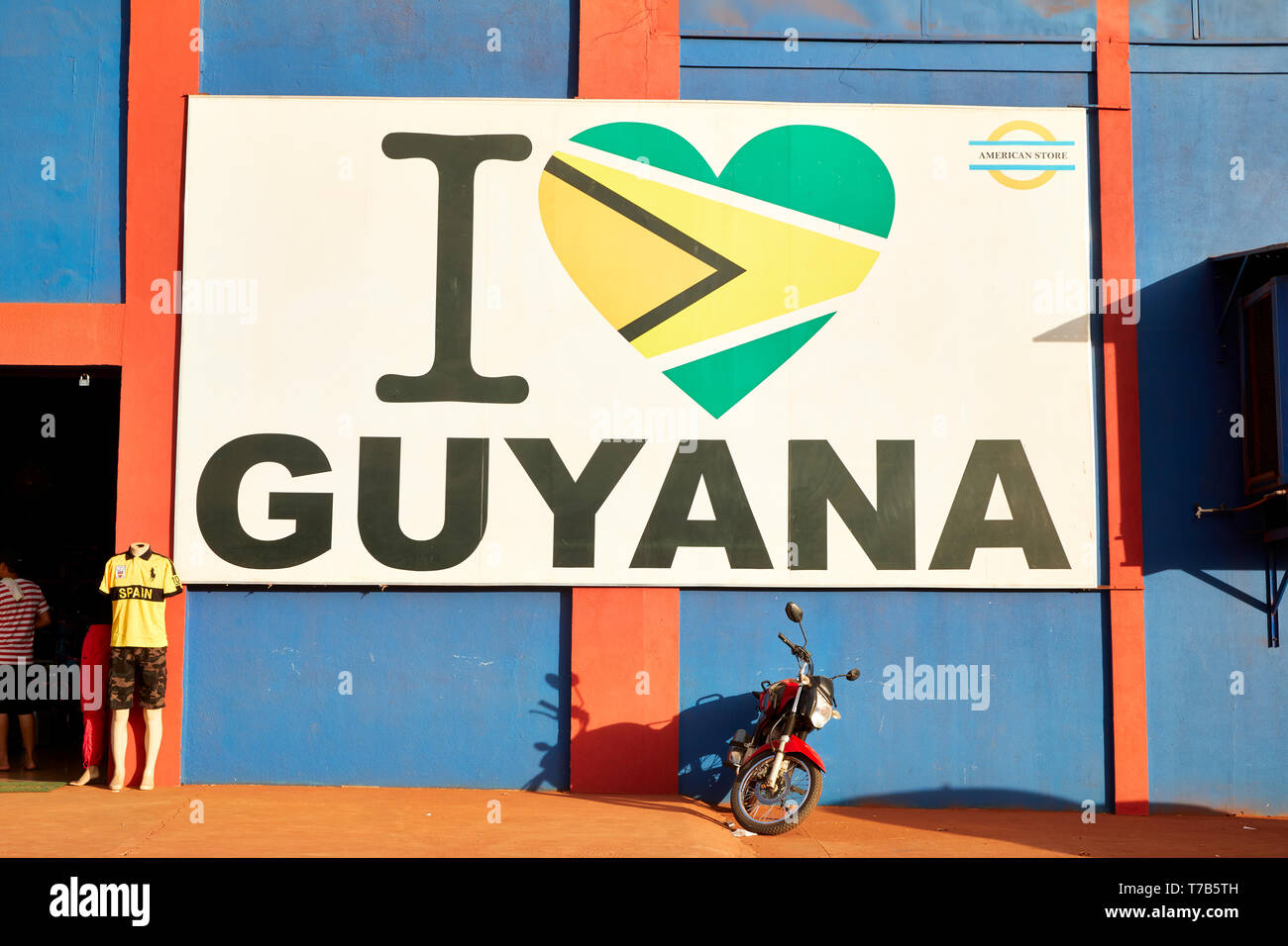 I Love Guyana Sign in front of American Store on Rupununi Road in Lethem Guyana South America Stock Photo