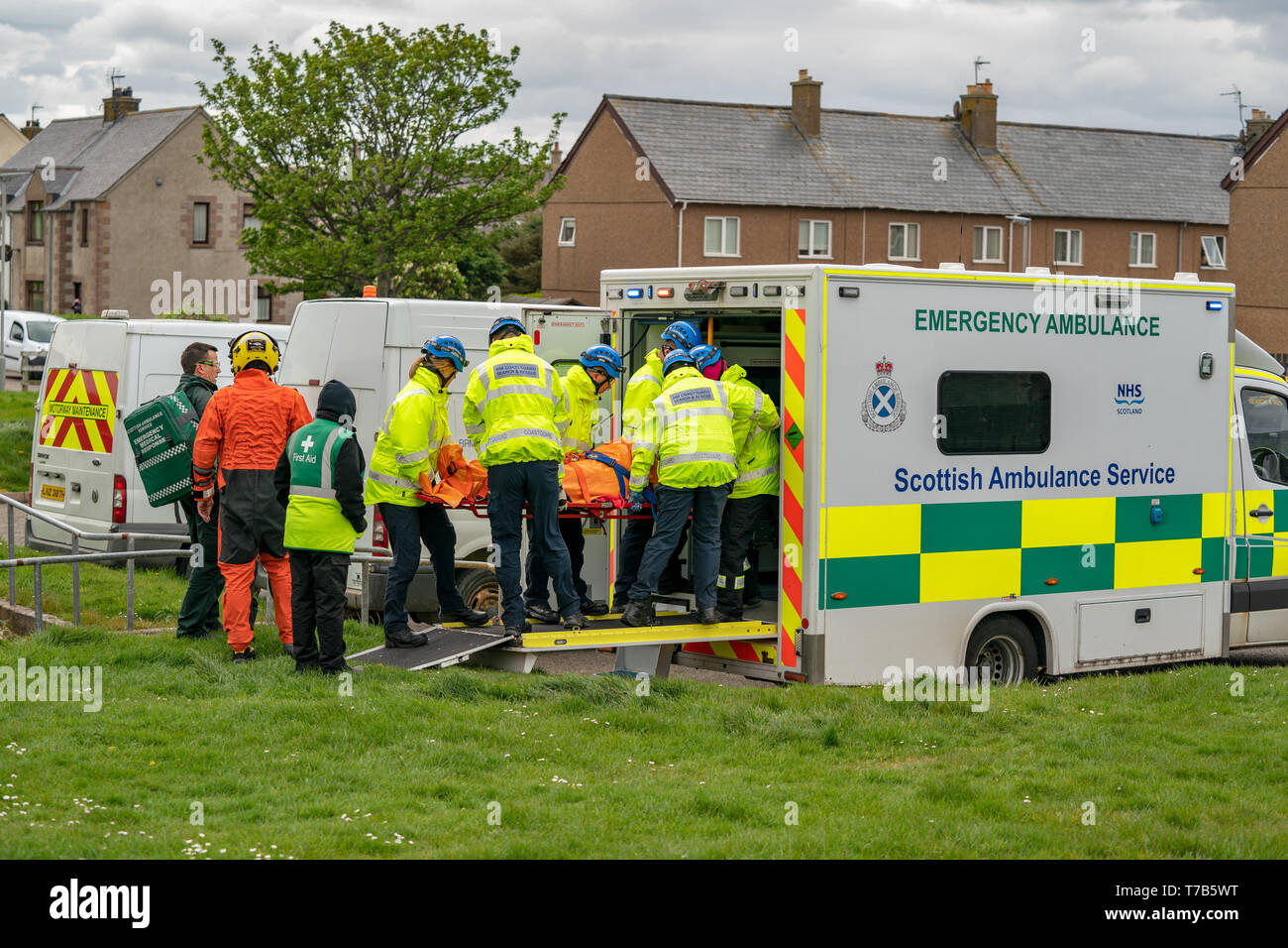 This is the rescue by HMCG (Coastguard) of a woman who fell during a charity walk and due to terrain, removed from locus by Rescue 151 Helicopter. Stock Photo