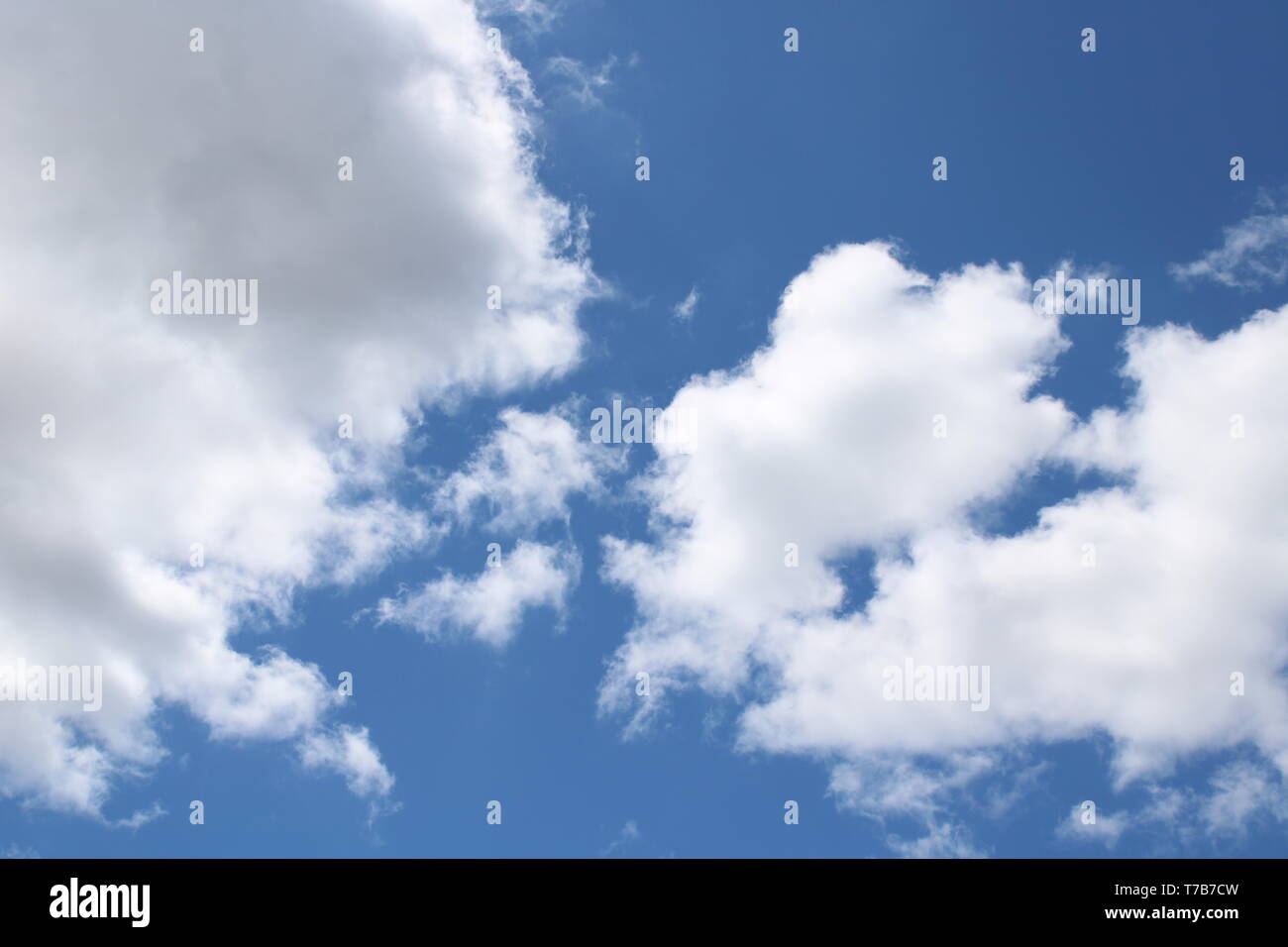 Spring Clouds Against a Blue Sky Stock Photo