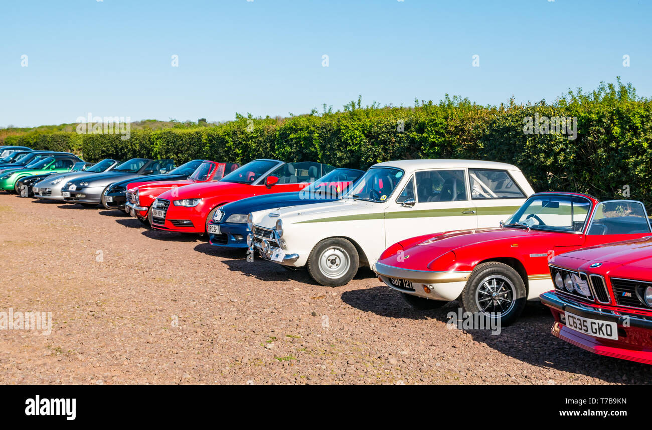 Row of parked classic and vintage cars, Archerfield Estate, North Berwick Rotary Club Classic Car Tour 2019, East Lothian, Scotland, UK Stock Photo
