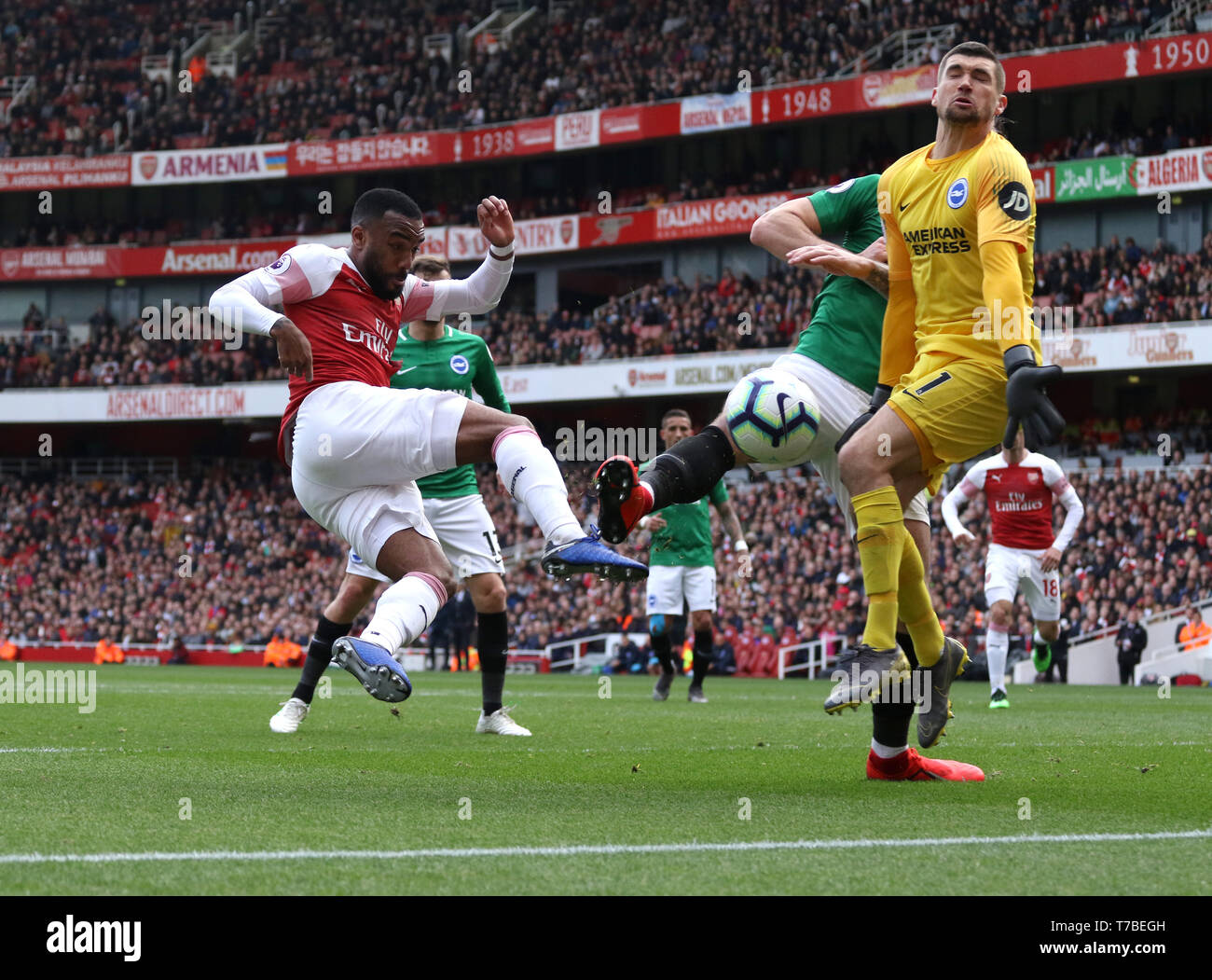 London, UK. 05th May, 2019. Alexandre Lacazette (A) has his shot saved by Mathew Ryan (B&HA) at the Arsenal v Brighton and Hove Albion English Premier League football match at The Emirates Stadium, London, UK on May 5, 2019. **Editorial use only, license required for commercial use. No use in betting, games or a single club/league/player publications** Credit: Paul Marriott/Alamy Live News Stock Photo