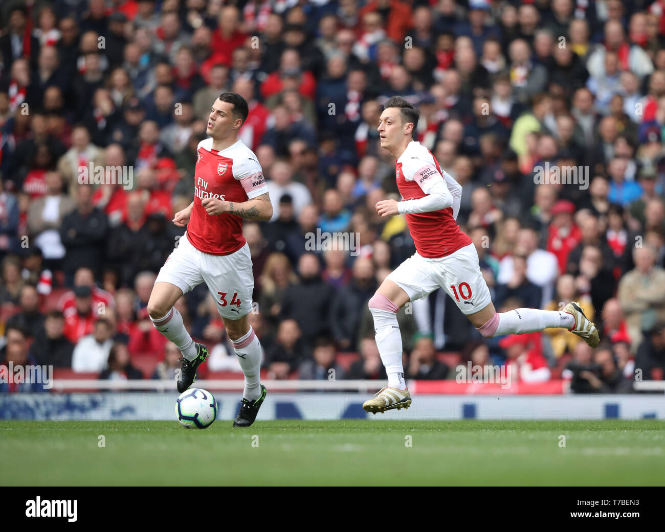 London, UK. 05th May, 2019. Granit Xhaka (A) Mesut Ozil (A) at the Arsenal v Brighton and Hove Albion English Premier League football match at The Emirates Stadium, London, UK on May 5, 2019. **Editorial use only, license required for commercial use. No use in betting, games or a single club/league/player publications** Credit: Paul Marriott/Alamy Live News Stock Photo