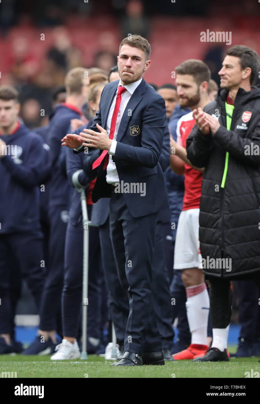 London, UK. 05th May, 2019. An emotional Aaron Ramsey (A) walks round to thank the fans, as he leaves Arsenal for Juventus at the end of the season, at the Arsenal v Brighton and Hove Albion English Premier League football match at The Emirates Stadium, London, UK on May 5, 2019. **Editorial use only, license required for commercial use. No use in betting, games or a single club/league/player publications** Credit: Paul Marriott/Alamy Live News Stock Photo