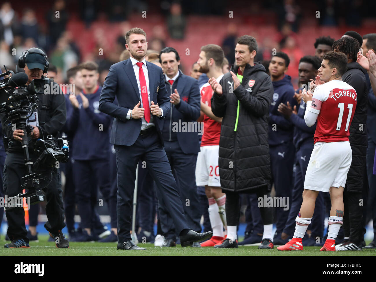 London, UK. 05th May, 2019. An emotional Aaron Ramsey (A) walks round to thank the fans, as he leaves Arsenal for Juventus at the end of the season, at the Arsenal v Brighton and Hove Albion English Premier League football match at The Emirates Stadium, London, UK on May 5, 2019. **Editorial use only, license required for commercial use. No use in betting, games or a single club/league/player publications** Credit: Paul Marriott/Alamy Live News Stock Photo