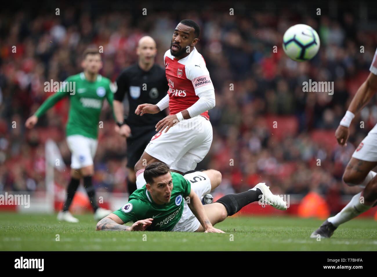London, UK. 05th May, 2019. Alexandre Lacazette (A) Lewis Dunk (B&HA) at the Arsenal v Brighton and Hove Albion English Premier League football match at The Emirates Stadium, London, UK on May 5, 2019. **Editorial use only, license required for commercial use. No use in betting, games or a single club/league/player publications** Credit: Paul Marriott/Alamy Live News Stock Photo