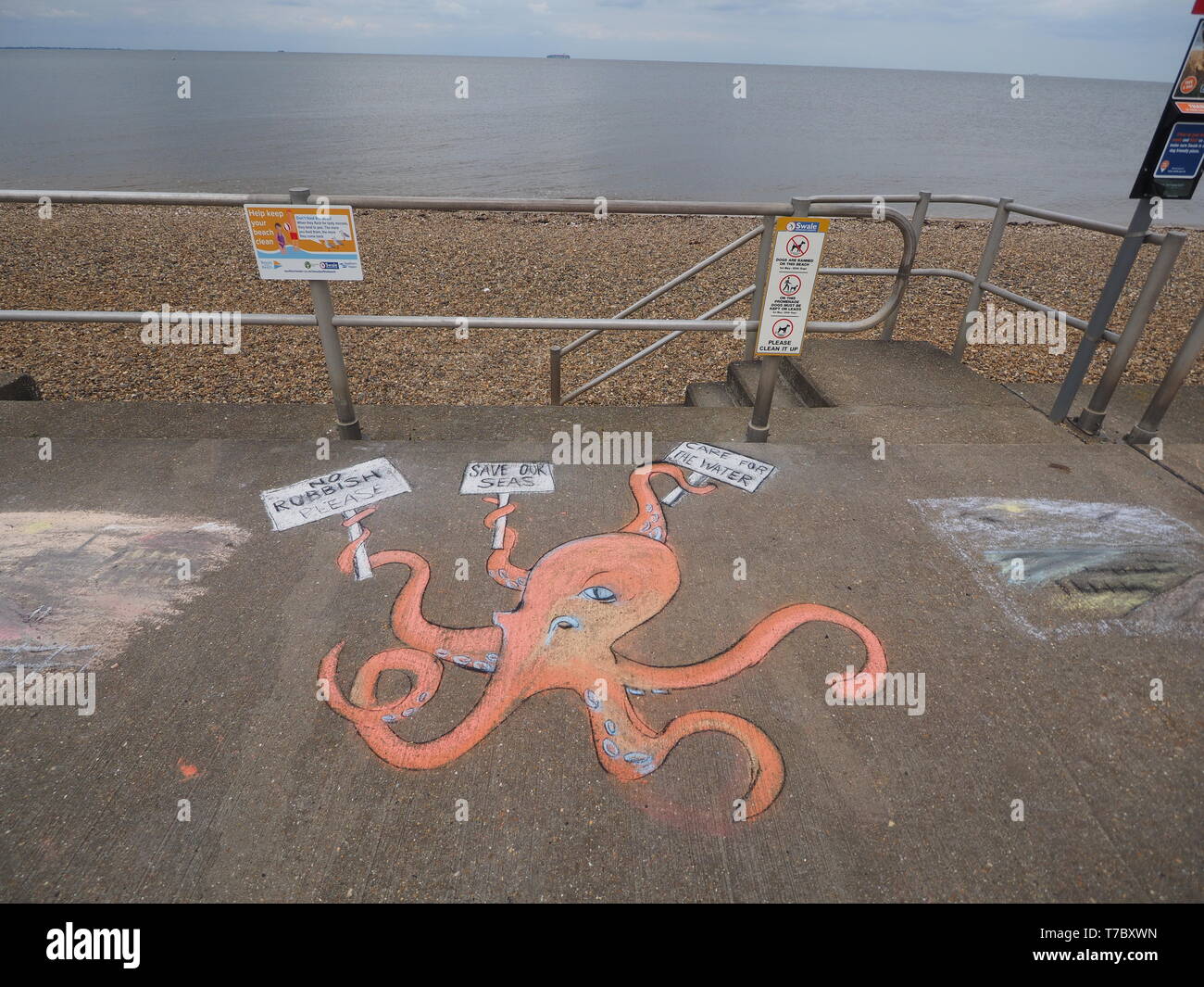 Minster on Sea, Kent, UK. 6th May, 2019. UK Weather: a cloudy afternoon in Minster on Sea, Kent, with rain threatening to wash away chalk art works from the re-run Chalk Marks event earlier today - local artists created chalk artworks with a seaside theme as part of an event organised by Squarecube Artisans. Credit: James Bell/Alamy Live News Stock Photo