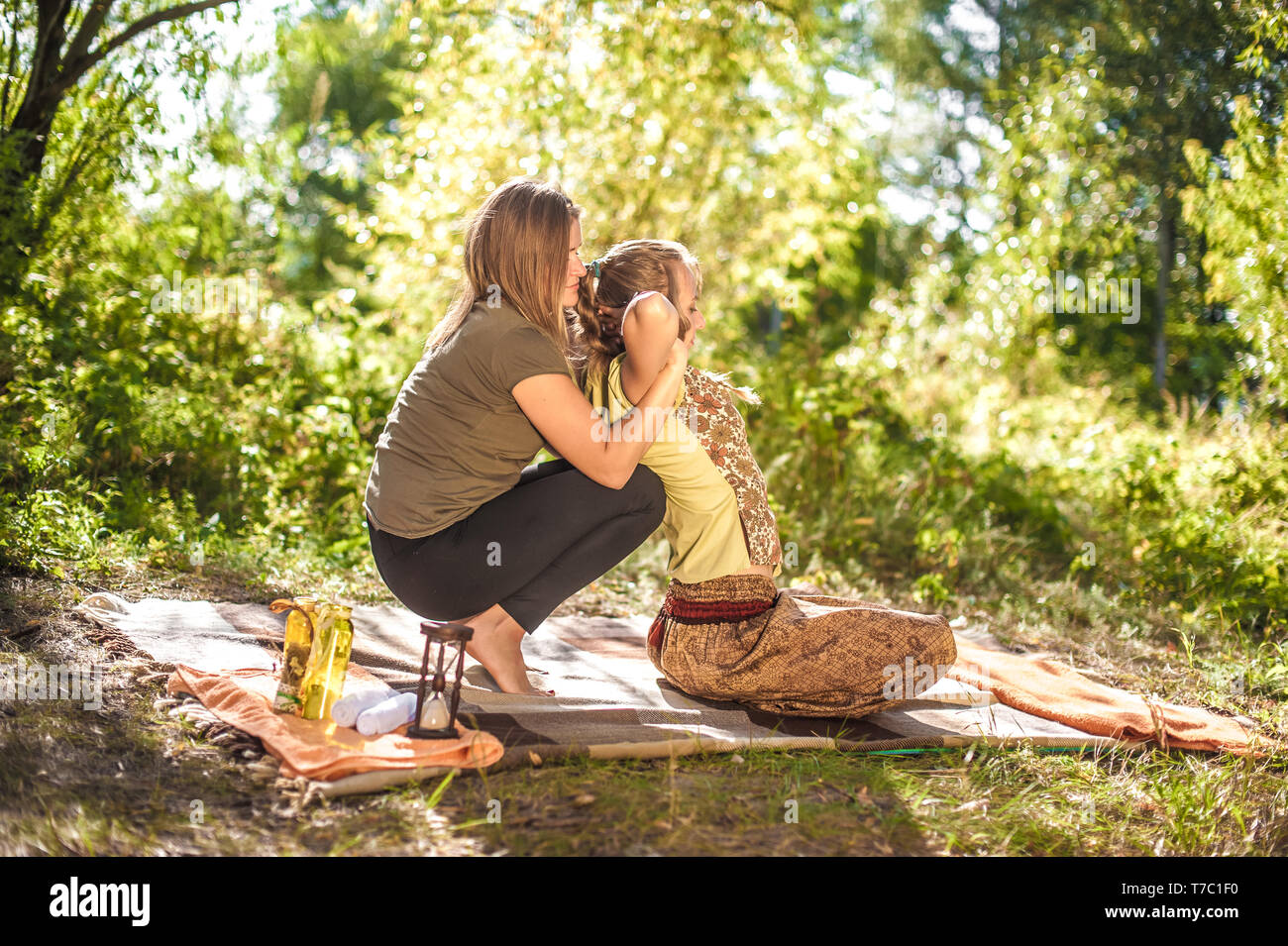 Massage professional demonstrates refreshing massaging methods in a