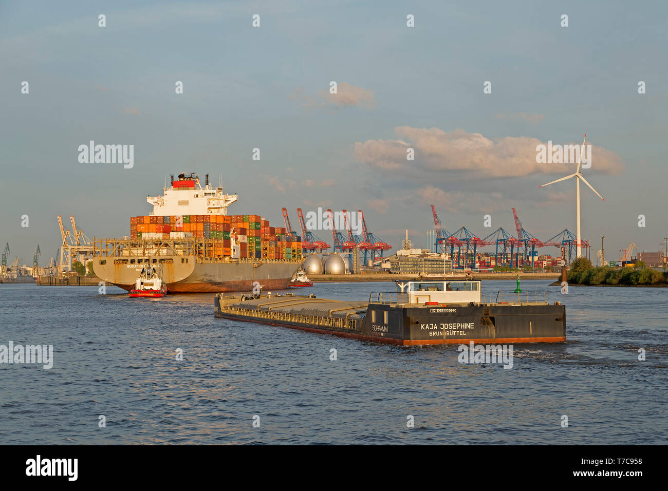 Container ship arriving at the harbour, Hamburg, Germany Stock Photo