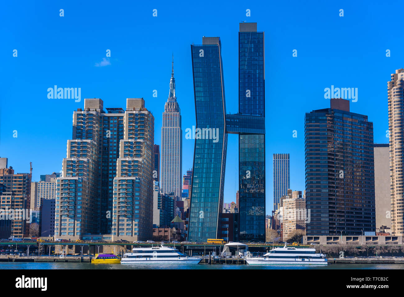 View from East Side River to Empire State Building - Manhatten Skyline of New York, USA Stock Photo