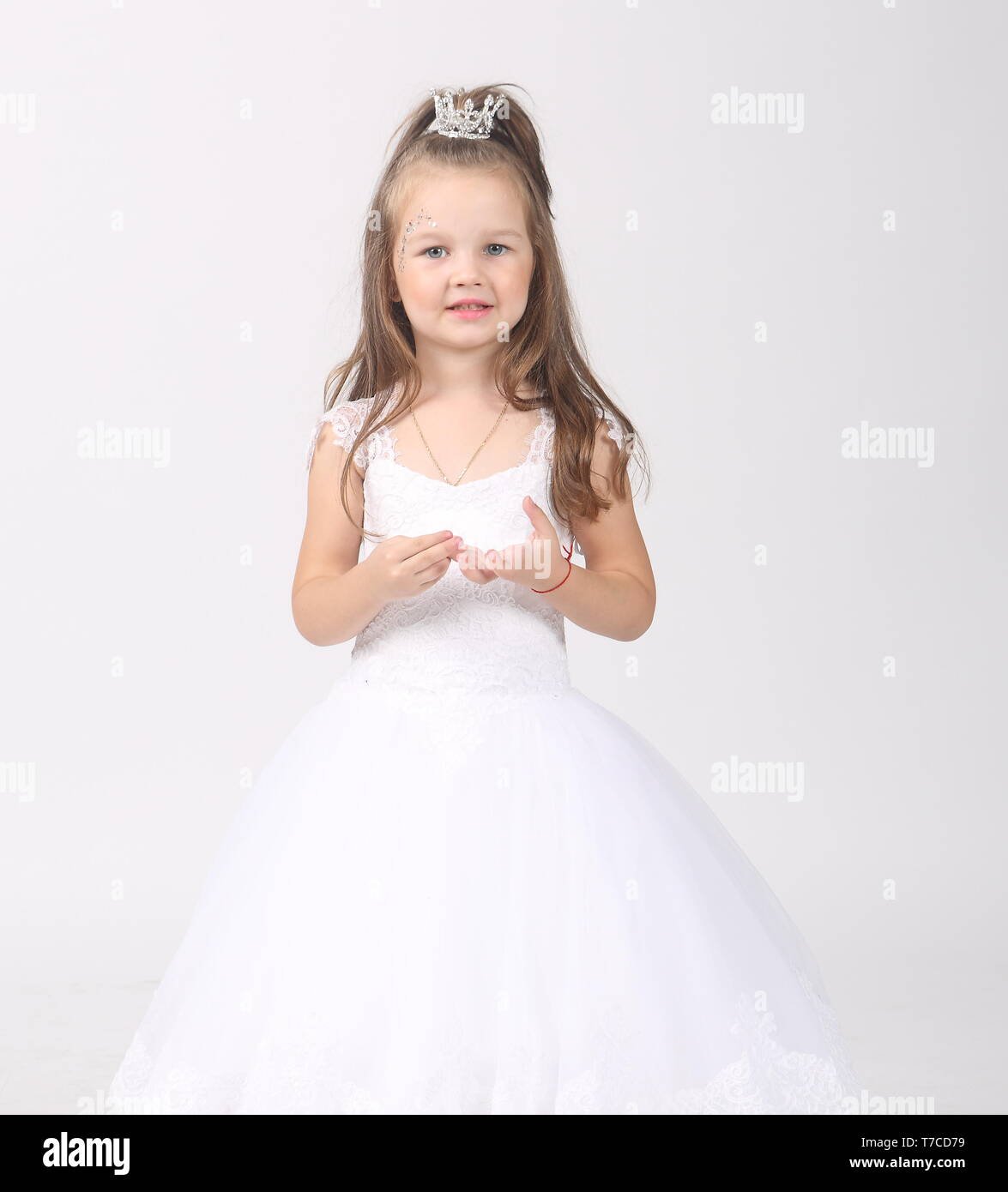 Little beautiful girl in white dress Stock Photo - Alamy