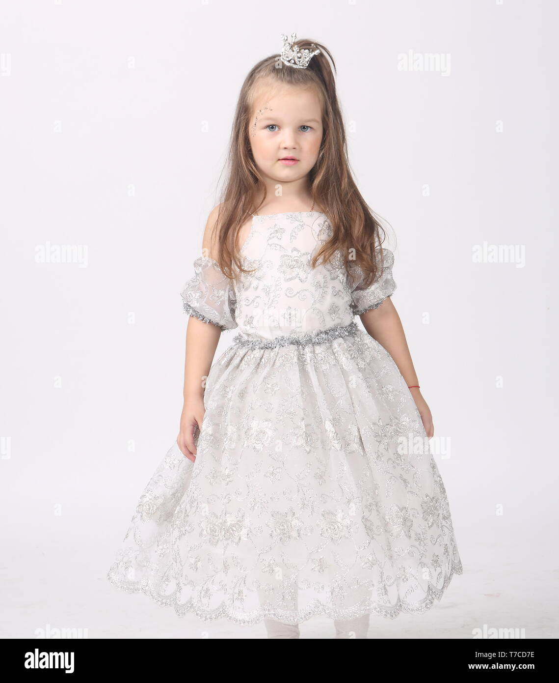 Little beautiful girl in white dress Stock Photo - Alamy