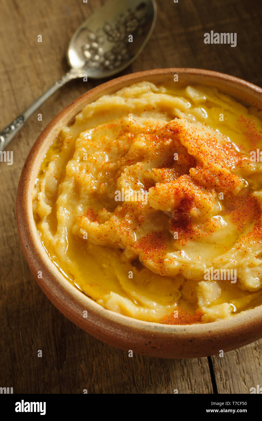 Greek Fava a traditional savoury dish made of yellow split peas with onions and garlic olive oil and paprika Stock Photo