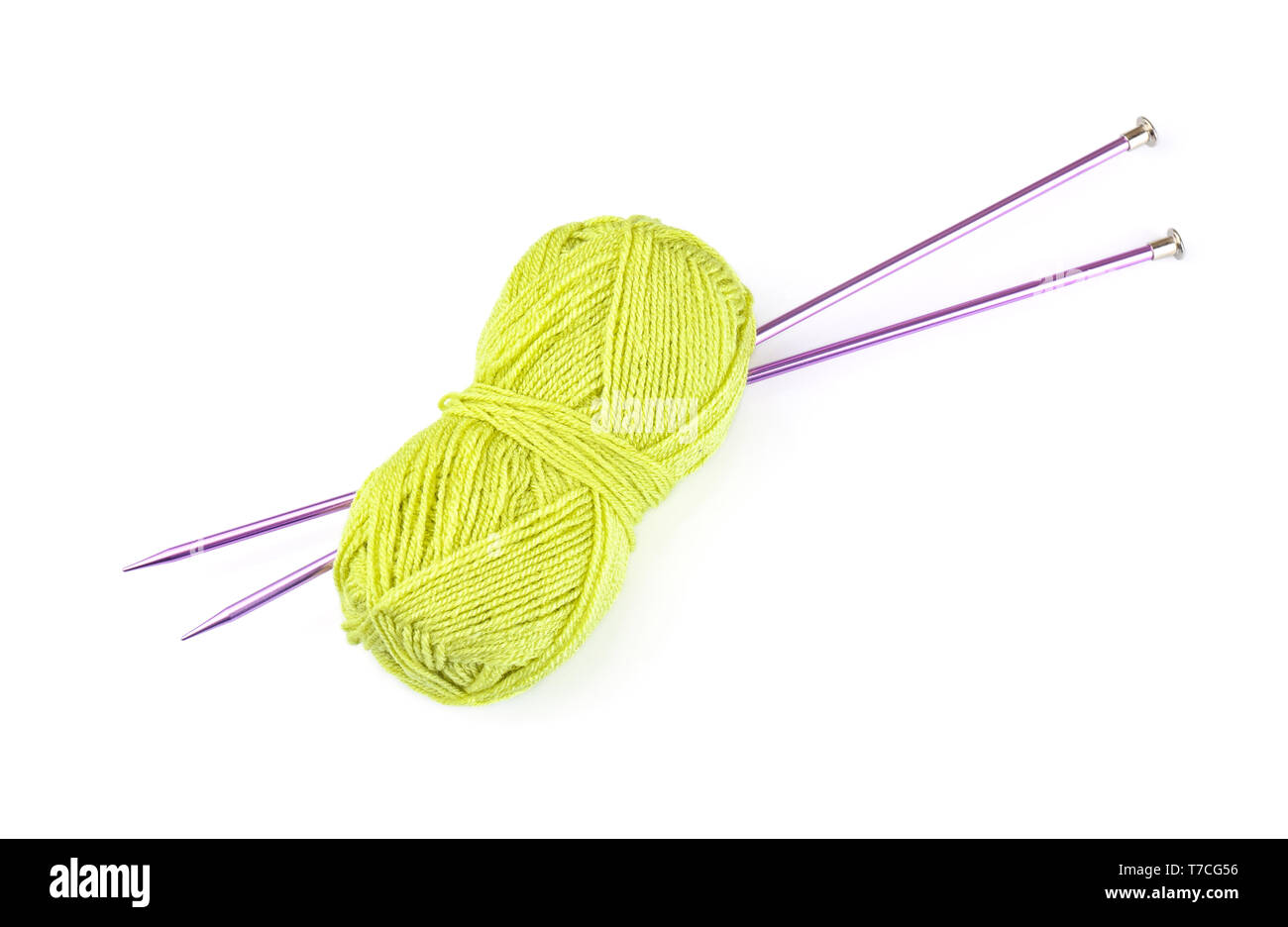 Knitting yarn with needles on white background Stock Photo - Alamy