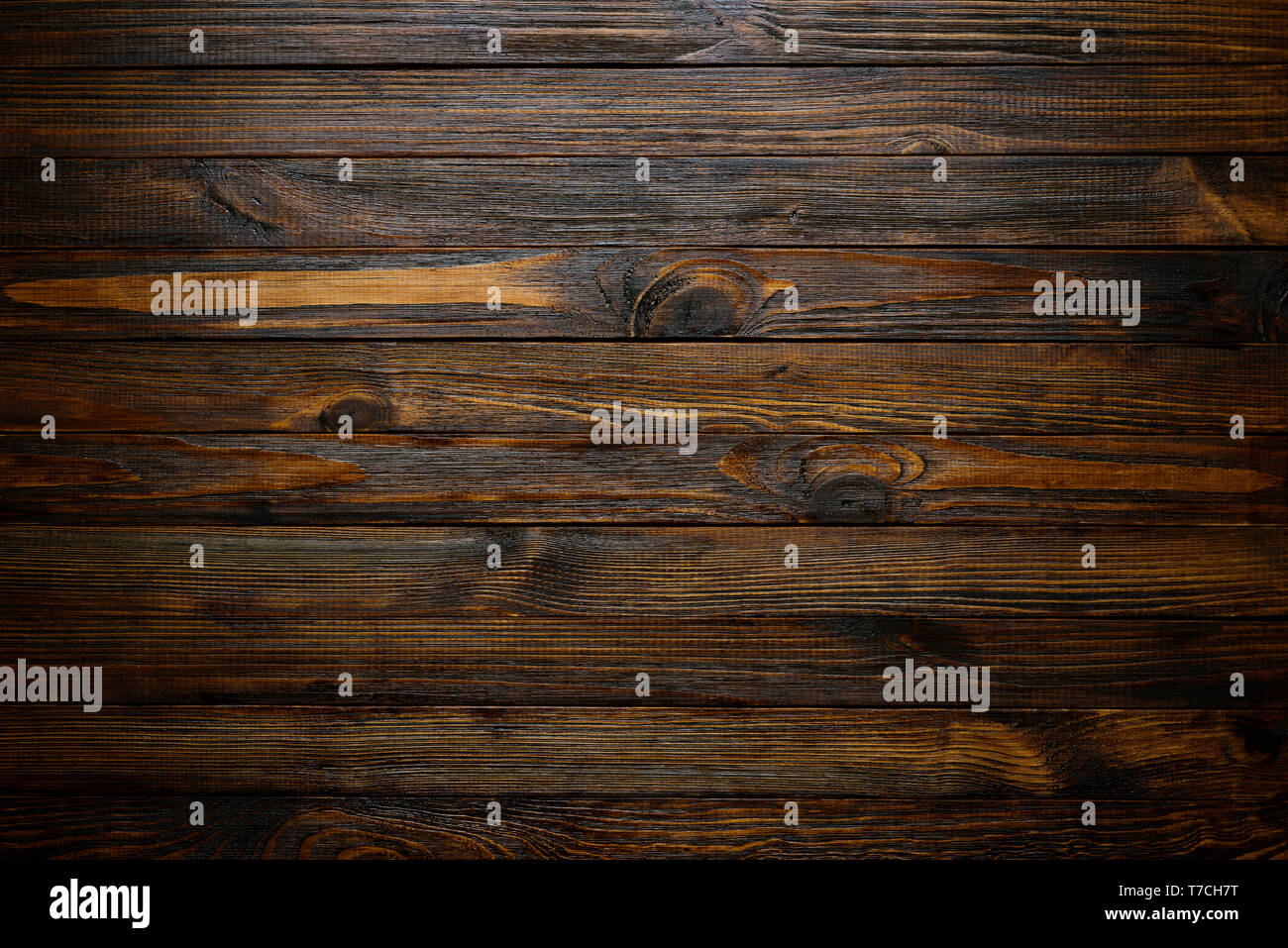 Natural wood texture. Wood background. Dark rustic planks table top flat lay view. Stock Photo